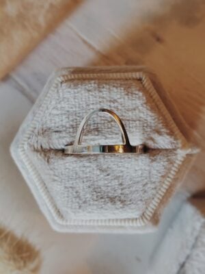St. Louis Arch Ring nestled in a cream velvet box with silk ribbon and dried florals