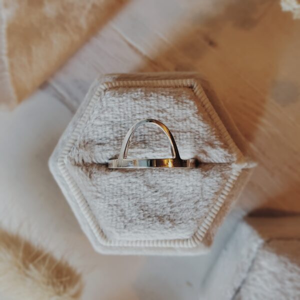 St. Louis Arch Ring nestled in a cream velvet box with silk ribbon and dried florals