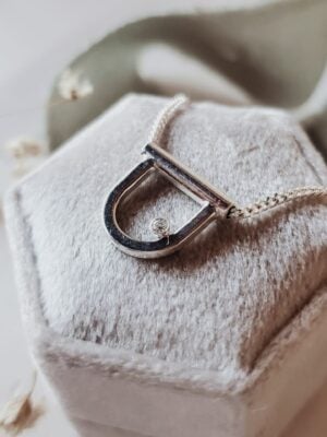 Siria Necklace – small silver modern arch necklace with moissanite