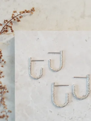 Lumen textured sterling silver J hoop earrings in Classic and Grand sizes