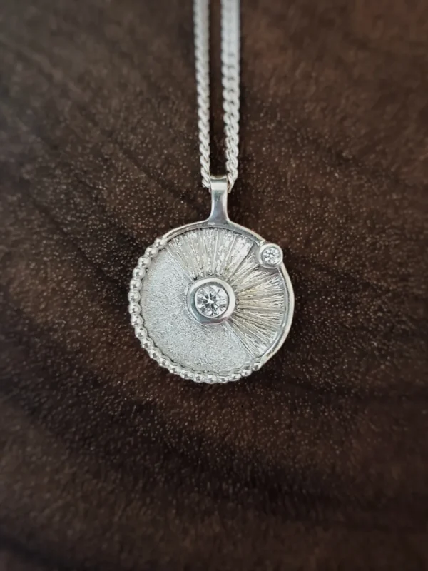 Solar Eclipse Medallion Pendant in Sterling Silver